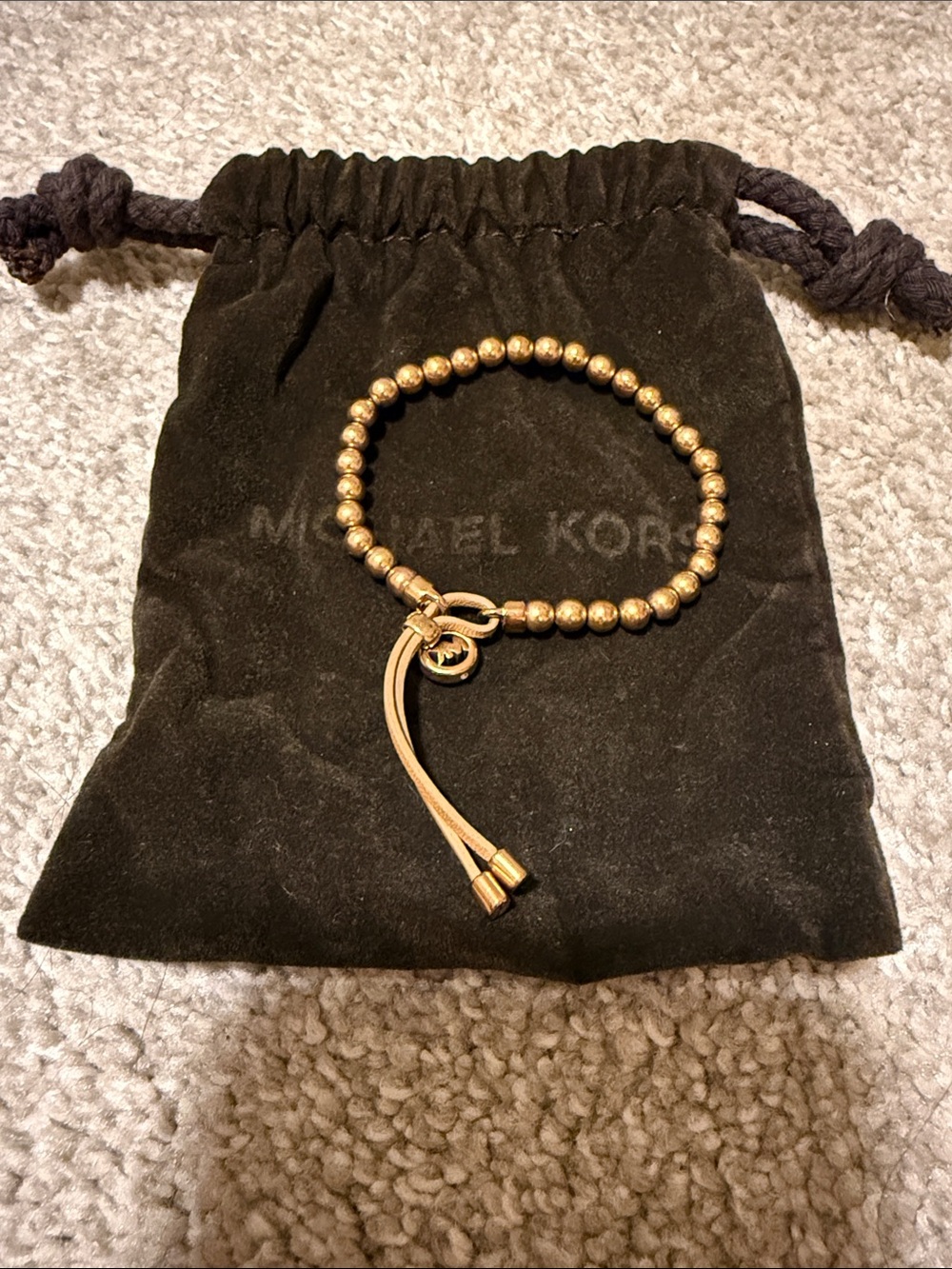 Michael Kors Rose Gold-Tone Beaded Bracelet with Leather Tassel